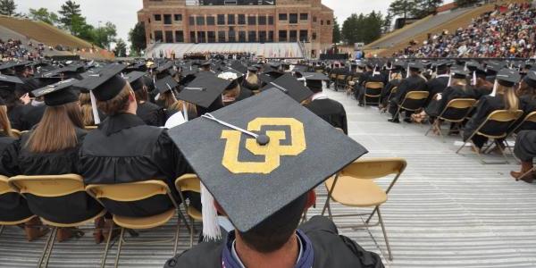 cu on student's graduation cap